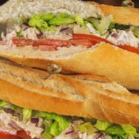 Tuna Salad Sandwich · Tuna mixed with Mayo, Red Onions & Celery; with Lettuce and Tomatoes.