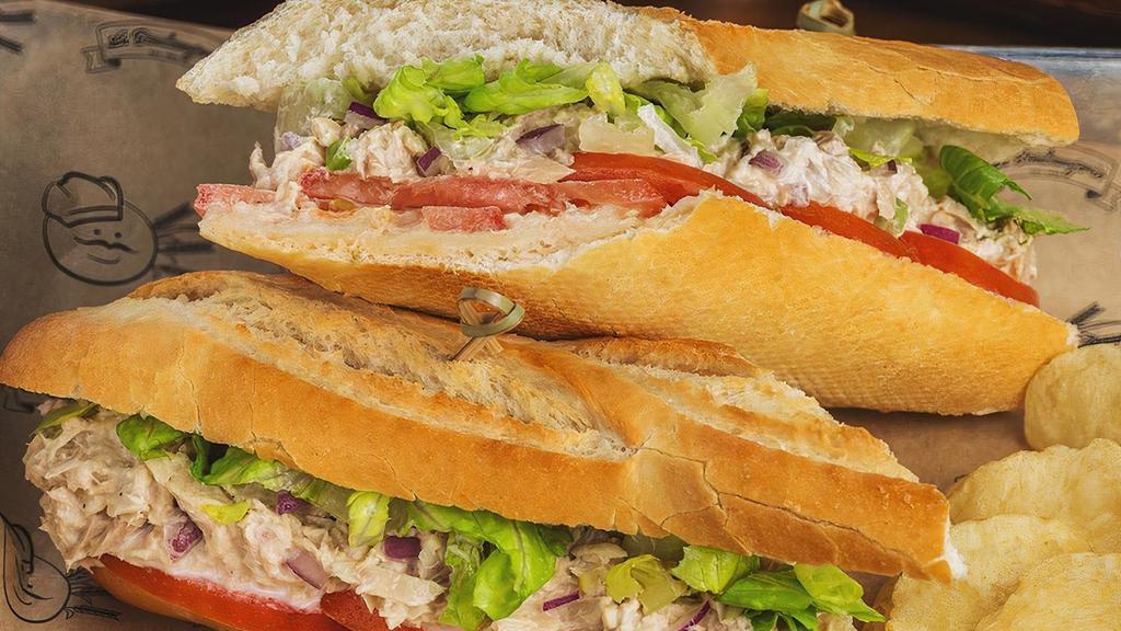 Tuna Salad Sandwich · Tuna mixed with Mayo, Red Onions & Celery; with Lettuce and Tomatoes.