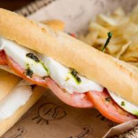 Caprese Sandwich · Mozzarella Cheese & Tomato slices, spread with Pesto sauce.