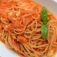 Spaghetti Pomodoro E Basilico · Al dente Pasta, Homemade fresh Tomato & Basil Sauce.