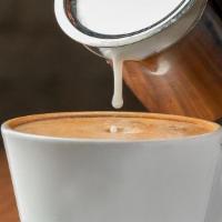 Café Au Lait · Espresso coffee with milk of your choice. Also known as Latte or Café con Leche.
