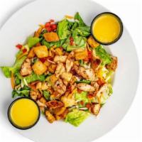 Grilled Chicken Salad · Our house salad topped with fresh to order grilled chicken breast.