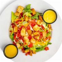 House Salad · An entree size salad topped with diced tomato, cheese, and croutons. Bacon upon request.