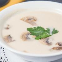 Coconut Soup · Soup with coconut milk, galanga, lemongrass broth with chicken and mushroom.