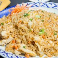 Fried Rice · Stir fried rice with carrot, egg, green onion, onion.