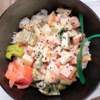 Sushi Bowl · Chopped salmon, tuna, crab, cubed cucumber, avocado, and spicy mayo on sushi rice.