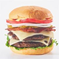 Miami Burger · 4 Oz. Fresh, Never Frozen Patties, On a Brioche Bun with Bacon, Swiss Cheese, Lettuce, Tomat...