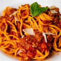 Spaghetti Bolognese · Pasta tossed in bolognese sauce.