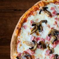 Prosciutto Cotto E Funghi · Tomato sauce, mozzarella, cooked ham and mushrooms.