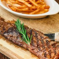 Grilled Skirt Steak · Served with french fries.