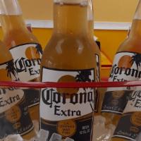 Corona · Corona es la cerveza Mexica mas vendida a nivel mundial. Es una cerveza tipo Lager Palida de...