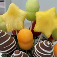 Mini Fruit Bouquet · Delicious Fruit Bouquet with chocolate-covered strawberries, pineapples, cantaloupe and hone...