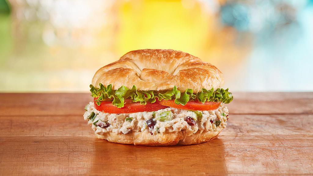 Chicken Salad · Freshly made chicken salad with lettuce and tomato on a flaky croissant. 540 cal.