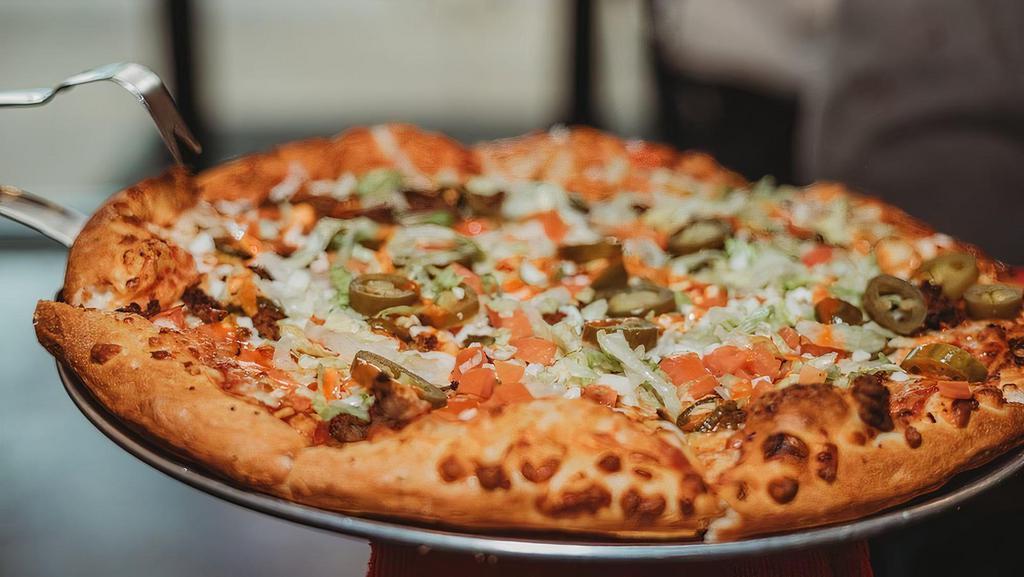 Veggie Pizza (Half & Half 18In Jumbo) · Red sauce, mozzarella, onion, banana pepper, green pepper, mushroom, spinach, and tomato.