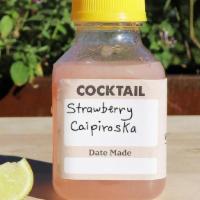 Strawberry Caipiroska · Tito’s Handmade Vodka, Fresh Strawberries, Fresh Lime