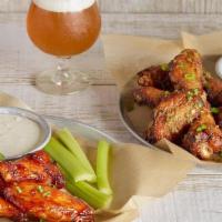 Wob Chicken Wings · Served with celery and your choice of house-made blue cheese or ranch.