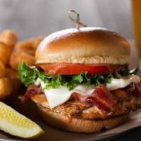Chipotle Chicken Sandwich · Grilled White Wheat beer-brined chicken breast with applewood smoked bacon, lettuce, tomato,...