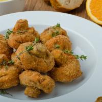 Fried Mushrooms · Mushrooms breaded and fried to golden perfection.