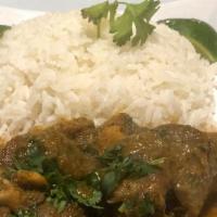 Goat Stew · Goat stew with rice and sweet plantains