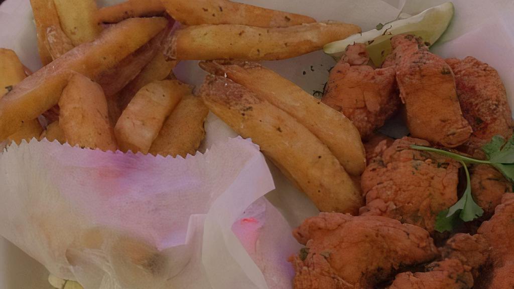 Deep Fried Salmon Bites · Tossed in choice of House Sauce served with Fries and Coleslaw.