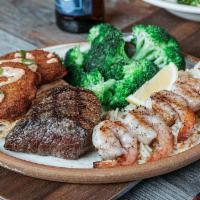 6 Oz. Sirloin Surf & Turf Trio · 6 oz. USDA Choice Sirloin, two crispy crab cakes and a skewer of mesquite-grilled shrimp ove...