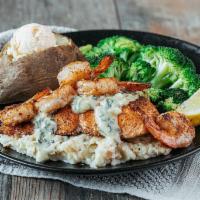 Shrimp Stacked Salmon · Lightly blackened 8 oz. salmon fillet served over mashed potatoes and topped with a creamy s...
