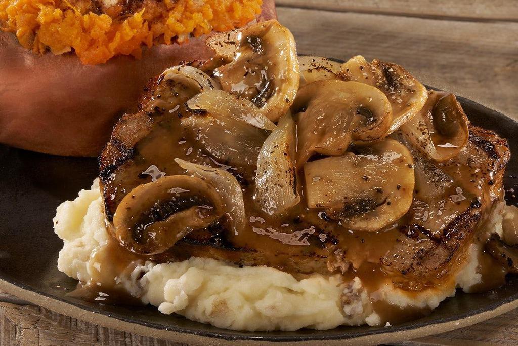 Grilled Meatloaf · Covered in brown gravy, Brewski Onions® and sautéed mushrooms, served over mashed potatoes.