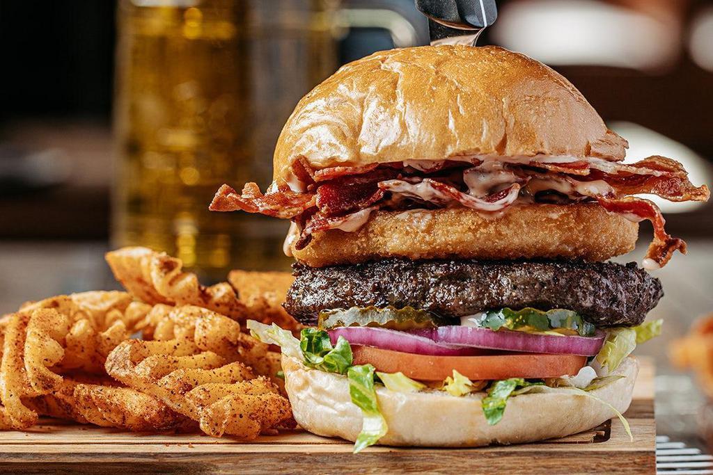 Fried Cheese & Bacon* · The best bacon cheeseburger in town! Fried cheese sticks, thick-cut hardwood smoked bacon, lettuce, tomato, pickles and red onion with burger sauce. Caution: Cheese is hot!