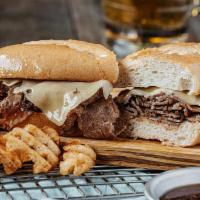 Piled High French Dip · Certified Angus Beef ®, thinly sliced in-house, dipped in hot au jus and topped with Swiss c...