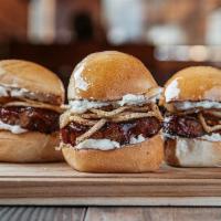Meatloaf Roadies® · Three mini meatloaf sliders with mashed potatoes, crispy onions & BBQ sauce on our signature...