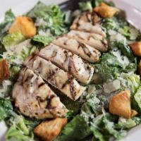 Mesquite-Grilled Chicken Caesar · Mesquite-grilled chicken smothered with our Parmesan Peppercorn dressing & served over crisp...