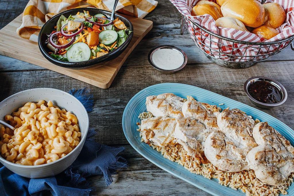 Family Meal - Grilled Chicken Dinner · Four 8 oz. all-natural chicken breasts served over Roadhouse Rice and your choice of Teriyaki or Parmesan Peppercorn style.