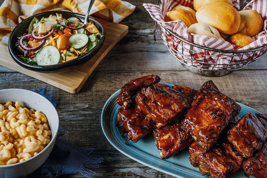 Family Meal - Bbq Ribs · 2 full racks of baby back ribs, slow-cooked in-house and basted with BBQ sauce.