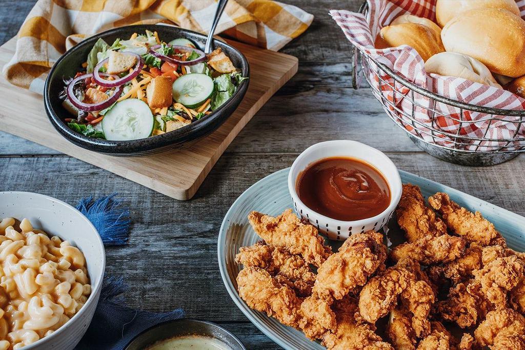 Family Meal - 20 Piece Twisted Chicken Tenders · Chicken tenders marinated in buttermilk for 24 hours and breaded in our Twisted seasoned flour blend. Choice of Honey Mustard, BBQ sauce or House-made Ranch.