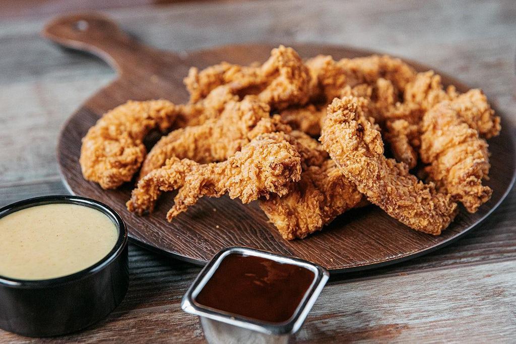 Party Pack Twisted Chicken Tenders · Chicken tenders marinated in buttermilk for 24 hours and breaded in our Twisted seasoned flour blend. Choice of Honey Mustard, BBQ sauce or House-made Ranch. Serves 10-12.