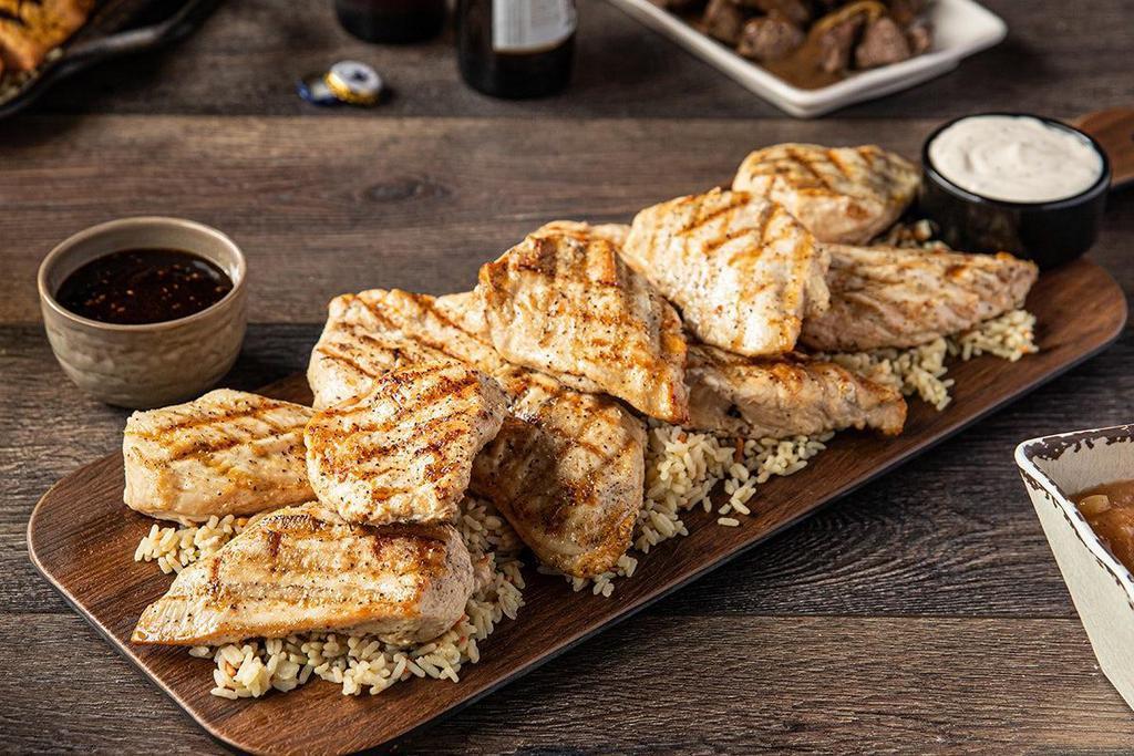 Party Pack Teriyaki-Glazed Chicken · All-natural, mesquite wood-grilled chicken breasts glazed with Teriyaki. Garnished with Roadhouse Rice. Serves 10-12.
