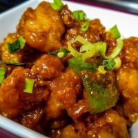 Gobi Manchurian · Fried cauliflower tossed in homemade Manchurian sauce and spring onions.