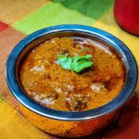 Lamb Rogan Josh · Kashmiri style slowly braised lamb curry infused with garlic, ginger and an aromatic, spicy ...