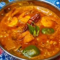 Karahi · Authentic style North Indian tomato based curry with onion, bell pepper infused with a spicy...