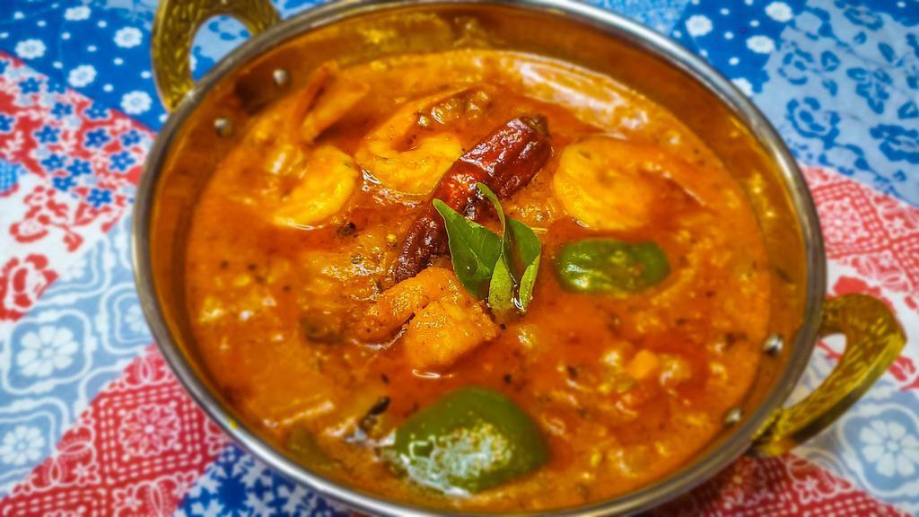 Karahi · Authentic style North Indian tomato based curry with onion, bell pepper infused with a spicy homemade masala. Served with Jeera rice. Can be made Vegan upon request.