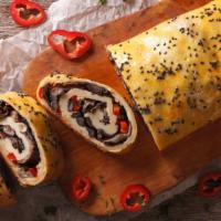 Veggie Stromboli · Scrumptious pizza dough turnover filled with peppers, onions, broccoli, spinach, tomatoes, a...