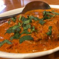 Chicken Tikka Masala · Tandoori roasted cubed chicken simmered in our special masala sauce.