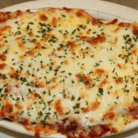Lasagna · Layered with beef and a blend of three cheeses topped with Mozzarella cheese.