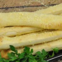 Bread Sticks · Baked bread, topped with garlic, butter and Parmesan cheese.