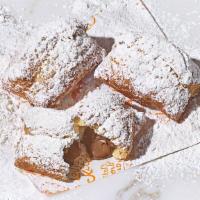 12Pc Chocolate Beignets · A warm and light New Orleans style pastry with a chocolate filling made with HERSHEY’S Cocoa...