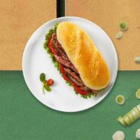 Steak House Sub Deluxe · Fine cuts of steak, resting on a bed of green pepper, mushroom, onion, mozzarella cheese and...
