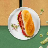 Italian Cold Cuts Sub · Ham, salami, mozzarella cheese, lettuce, tomatoes, pickles, green peppers, green and black o...