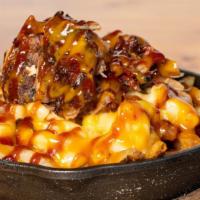 Loaded Fries · Mack & cheese pulled pork and bacon topped with a drizzle of Carolina mustard bbq sauce & Ka...