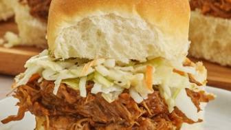 Sliders (Pulled Pork) · In House Slow Smoked Pulled Pork With BBQ Sauce, coleslaw and topped with onion strings.