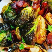 Crispy Brussels & Bacon · Crispy sprouts flash fried with applewood smoked bacon, tossed in a sherry vinaigrette, serv...